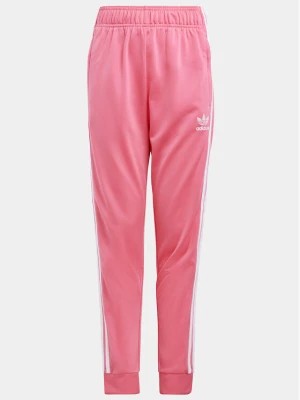 Zdjęcie produktu adidas Spodnie dresowe adicolor SST IN8492 Różowy Regular Fit