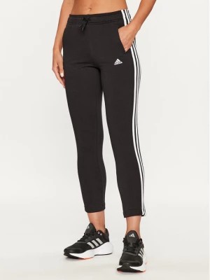 Zdjęcie produktu adidas Spodnie dresowe Essentials 3-Stripes IC6126 Czarny Slim Fit