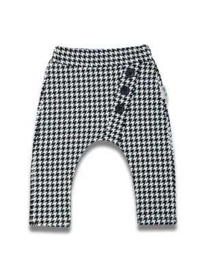 Zdjęcie produktu Bawełniane spodnie dresowe czarno-białe w pepitkę dla dziewczynki Nicol