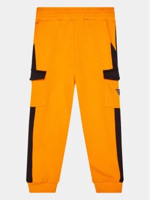 Zdjęcie produktu Guess Spodnie dresowe L3YQ12 KA6R3 Pomarańczowy Regular Fit