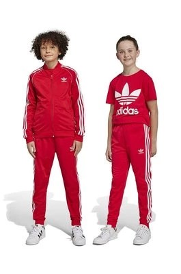 Zdjęcie produktu adidas Originals spodnie dresowe dziecięce kolor czerwony wzorzyste