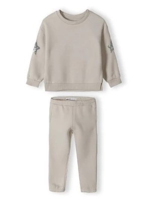 Zdjęcie produktu Beżowy komplet dresowy- bluza z gwiazdkami i spodnie dresowe Minoti