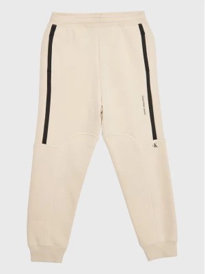 Zdjęcie produktu Calvin Klein Jeans Spodnie dresowe Seaming Skater IB0IB01506 Beżowy Regular Fit
