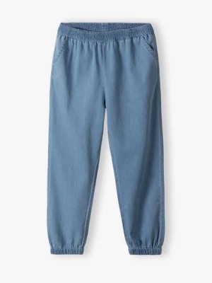 Zdjęcie produktu Cienkie jeansowe spodnie dziewczęce - haremki - 5.10.15.