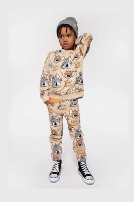 Zdjęcie produktu Coccodrillo spodnie dresowe bawełniane dziecięce kolor beżowy wzorzyste