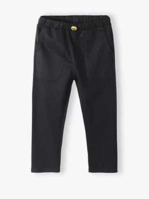 Zdjęcie produktu Czarne proste spodnie dresowe dla dziecka 5.10.15.