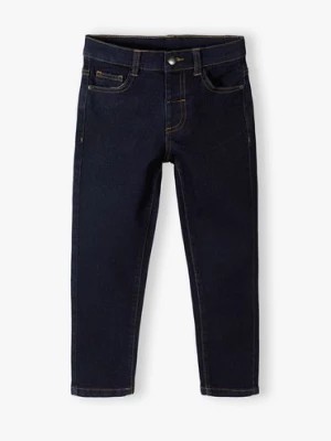 Zdjęcie produktu Granatowe spodnie jeansowe slim dla chłopca - 5.10.15.