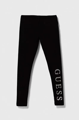 Zdjęcie produktu Guess legginsy dziecięce kolor czarny z nadrukiem