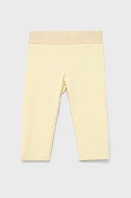 Zdjęcie produktu Guess legginsy dziecięce kolor żółty gładkie