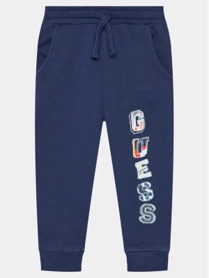 Zdjęcie produktu Guess Spodnie dresowe N4GQ11 KA6R3 Granatowy Regular Fit