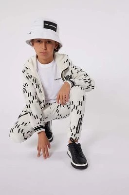 Zdjęcie produktu Karl Lagerfeld spodnie dresowe bawełniane dziecięce kolor beżowy wzorzyste