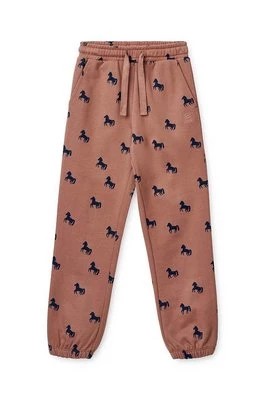 Zdjęcie produktu Liewood spodnie dresowe bawełniane dziecięce kolor różowy gładkie