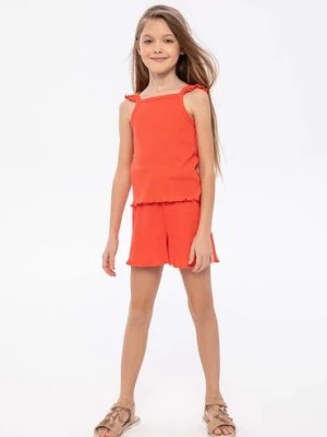 Zdjęcie produktu Pomarańczowy komplet dziewczęcy - bluzka na ramiączkach + spodenki Minoti