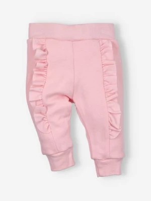 Zdjęcie produktu Spodnie niemowlęce PINK FLOWERS z bawełny organicznej z falbankami NINI