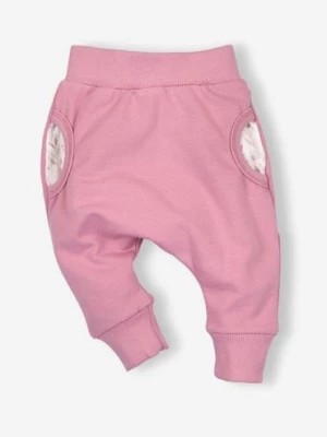 Zdjęcie produktu Spodnie niemowlęce z bawełny organicznej dla dziewczynki różowe NINI