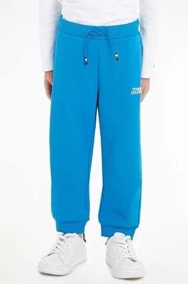 Zdjęcie produktu Tommy Hilfiger spodnie dresowe dziecięce kolor niebieski z aplikacją