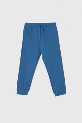 Zdjęcie produktu United Colors of Benetton spodnie dresowe bawełniane dziecięce kolor niebieski gładkie
