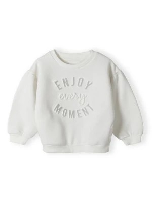 Zdjęcie produktu Bluza dla dziewczynki z brokatowym napisem - Enjoy every moment Minoti